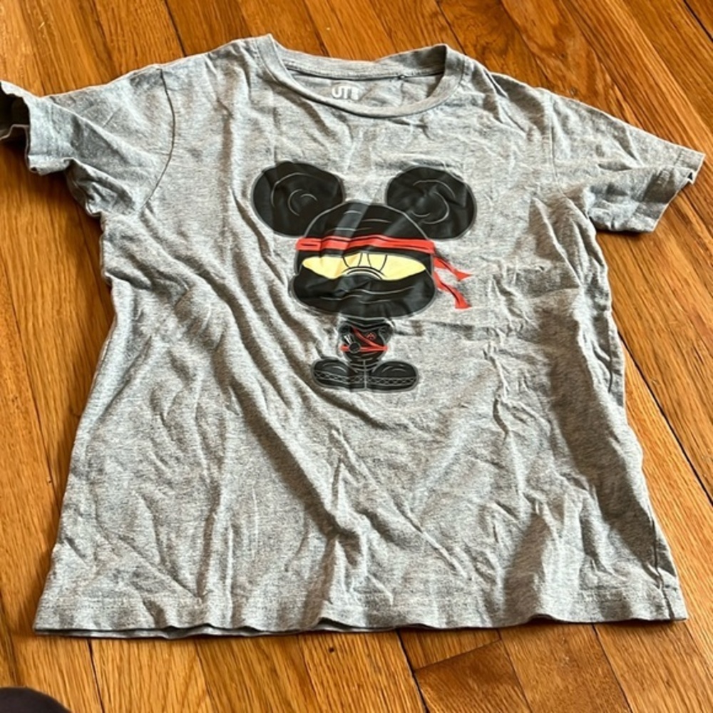 Gently used Disney Mickey Uniqlo rare ninja t shirt gently used 7/8 fit is 5/6.